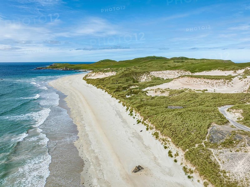 Aerial view of Faraid Head peninsula with dunes and sandy beach