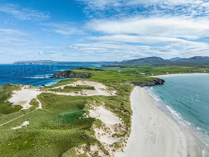 Aerial view of Faraid Head Peninsula and Balnakeil Beach with dunes and sandy beach