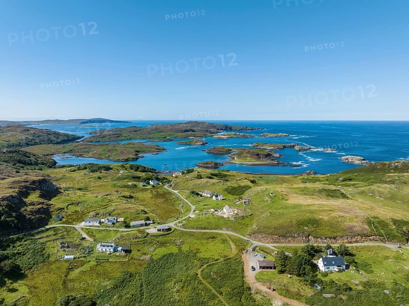 Aerial view of the village and scattered settlement of Drumbeg and Eddrachillis Bay on the Atlantic coast