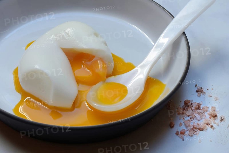 Soft boiled egg with spoon