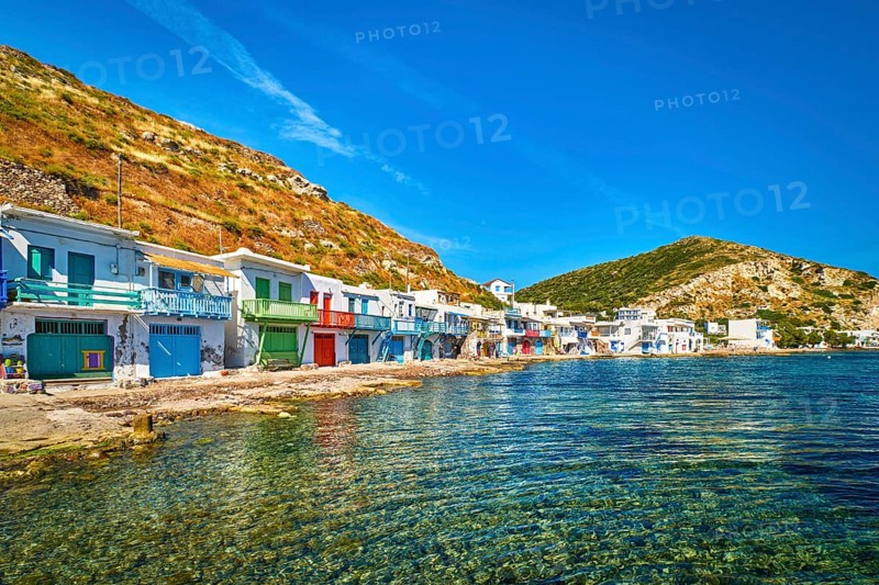 Colorful village of Klima with Greek whitewashed houses on sunny day