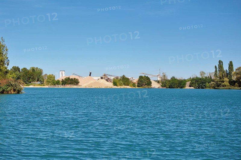 Gravel quarry at excavation lake called 'Betonsee' in Waghaeusel-Wiesental