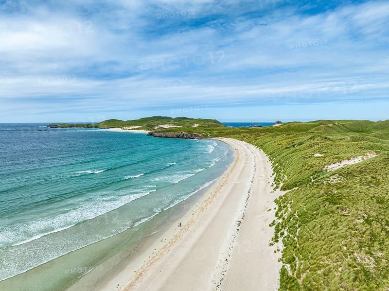 Aerial view of Balnakeil Beach and the Faraid Head peninsula with sandy beach and dune landscape