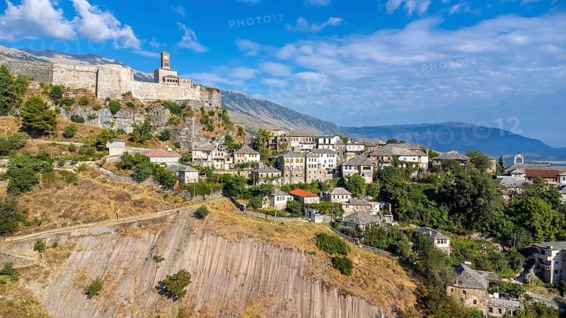 Aerial drone view of the old castle and fortress of the city of Gjirokaster or gjirokastra