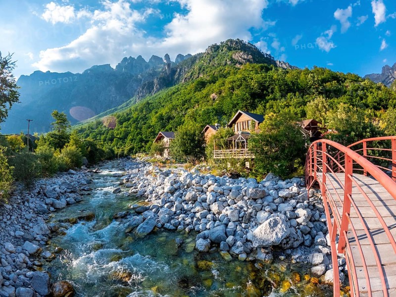 Red bridge along the river of Valbona Valley