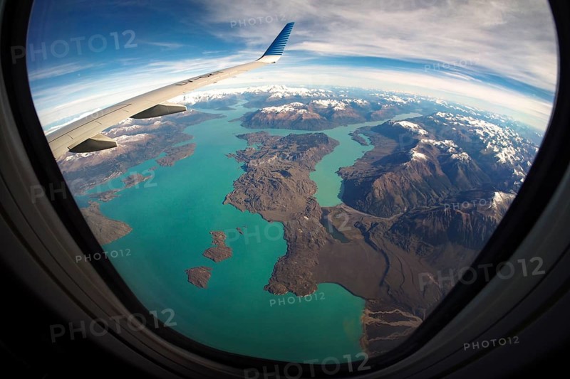 View from the plane of the snow-capped Andes and Lago San Martin