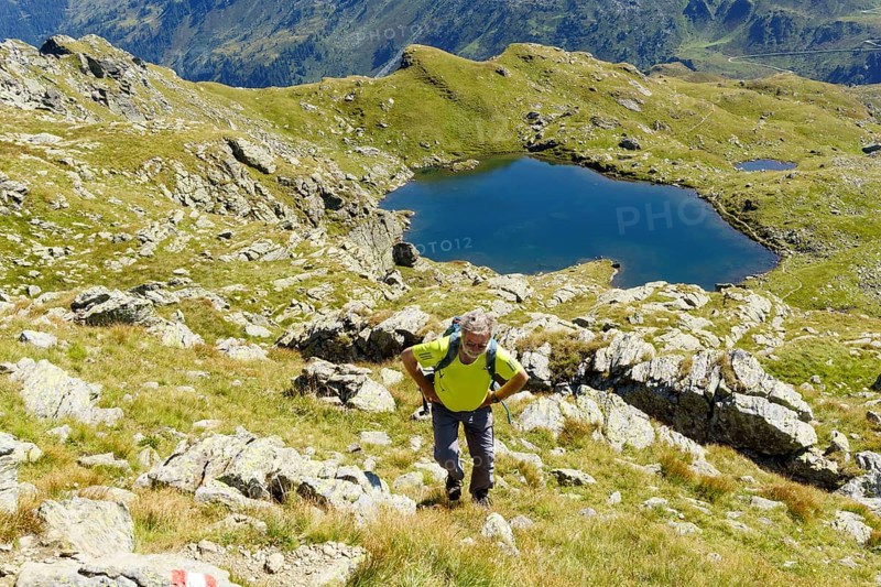 Hiker climbing the mountain Schafsiedel