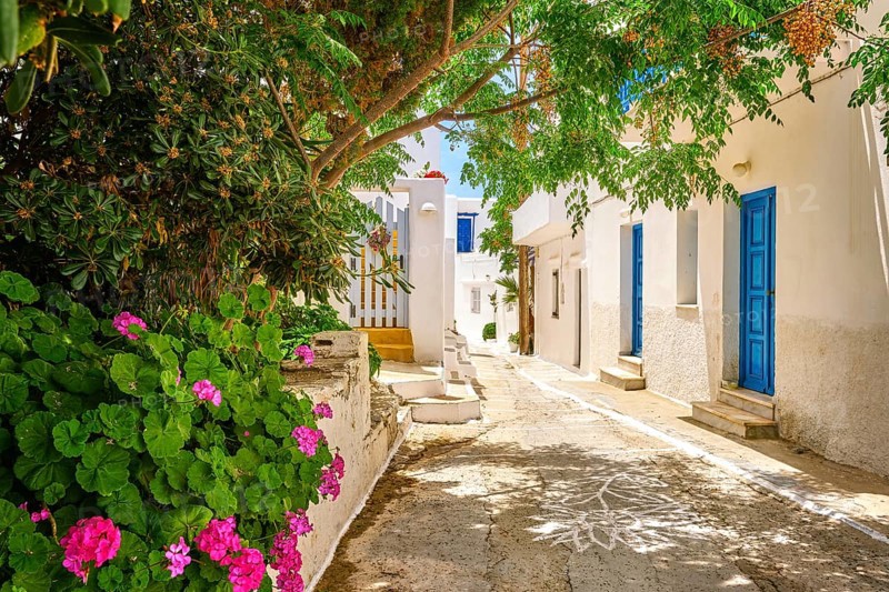 Cosy traditional summer streets and beautiful walkways of Greek town