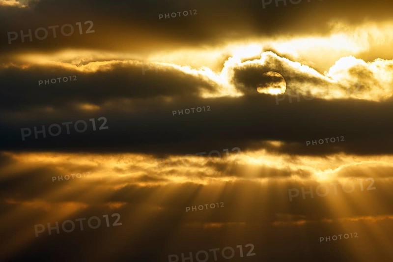 Sunbeams shining through clouds