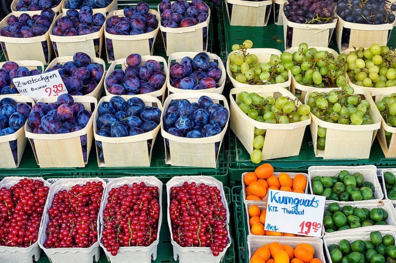 Market stall with plums