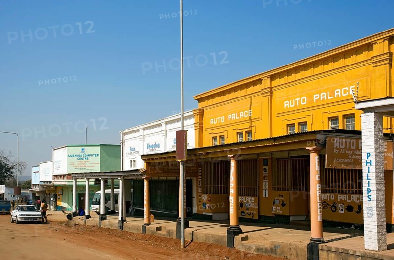 Colonial buildings and old sand road