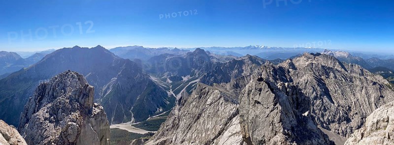 Panorama from the summit of Hochkalter to the mountains of Berchtesgaden National Park