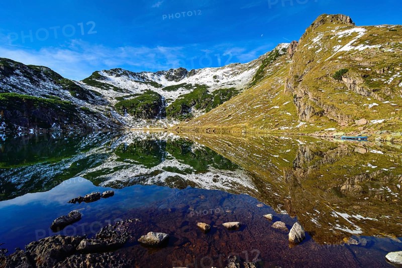 Reflection in the Wildsee lake at Wildseeloder in autumn early morning