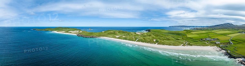 Aerial panorama of Balnakeil Bay with sandy beach and dunes on the right