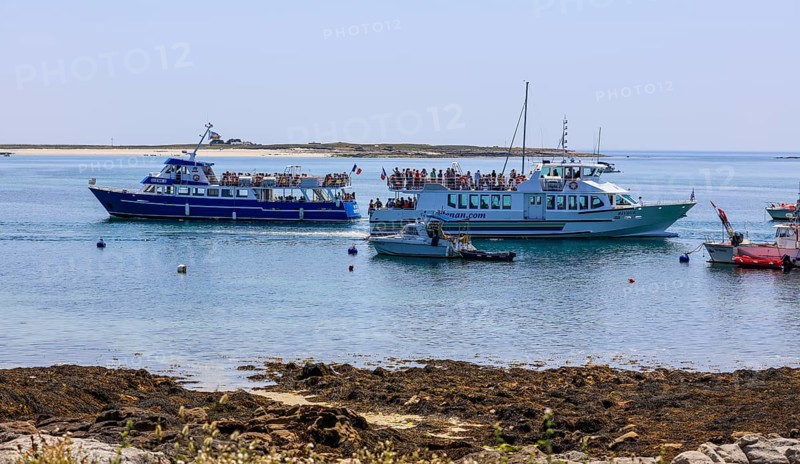 Tourist boats near the jetty of Ile Saint-Nicolas