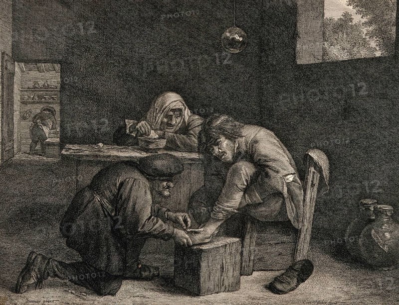 A surgeon treats the foot of a male patient