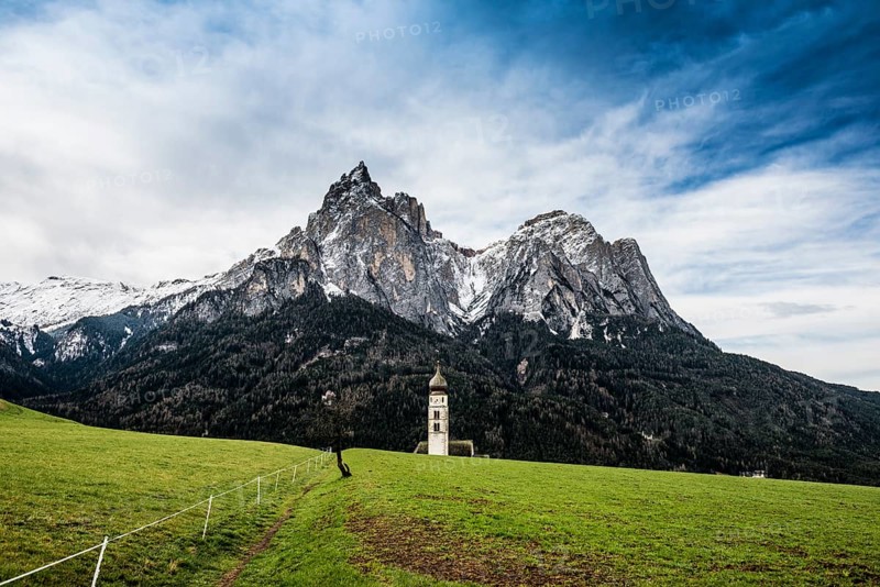 Snow-covered mountains and church