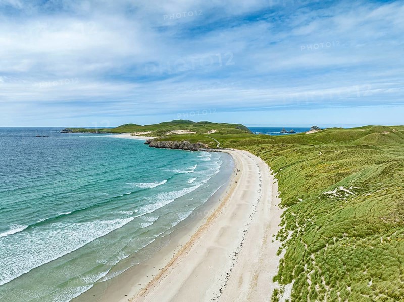 Aerial view of Balnakeil Beach and the Faraid Head peninsula with sandy beach and dune landscape