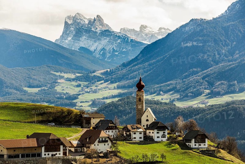 Snow-covered mountains and church