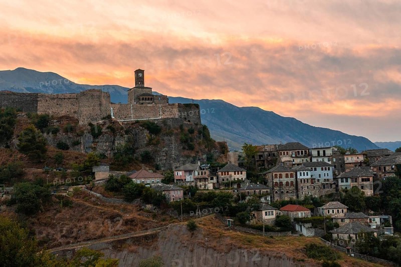 Sunset over the clock tower and Gjirokaster fortress