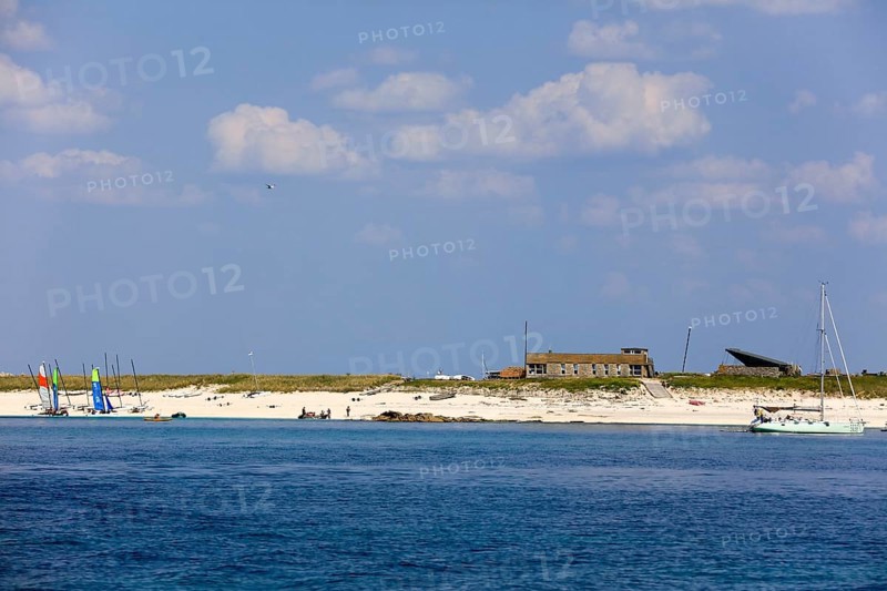 Sandy beach beach of the island Ile de Penfret with sailing school Les Glenans