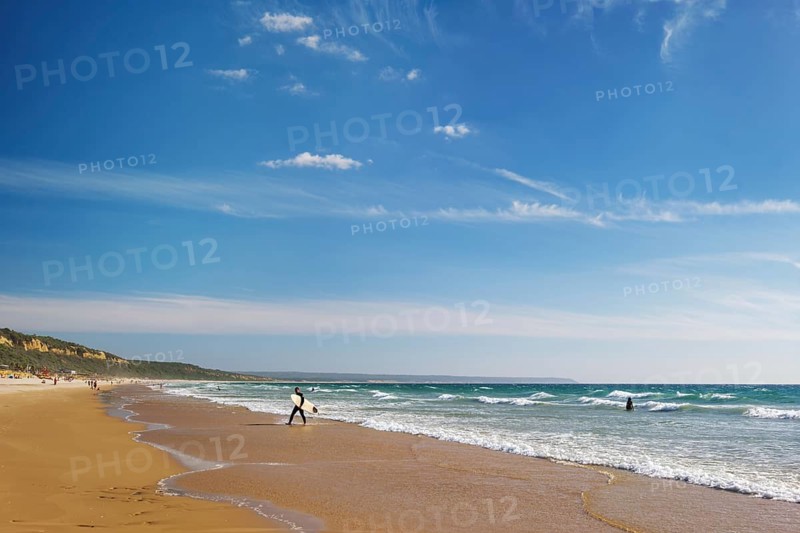 Sandy Atlantic ocean beach at Fonte da Telha beach