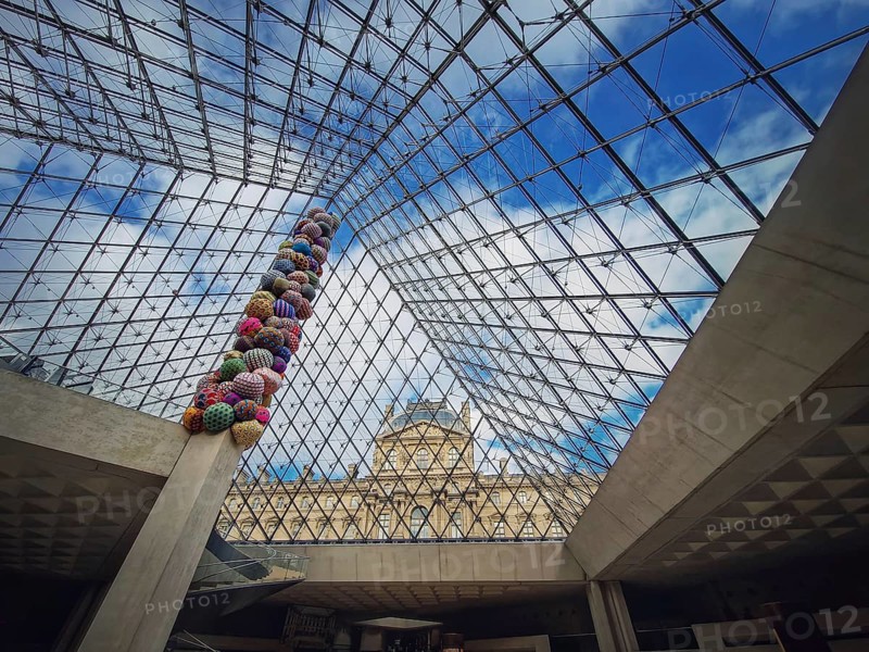 Underneath the Louvre glass pyramid. Beautiful architectural details with an abstract mixture of classical and modern architecture styles