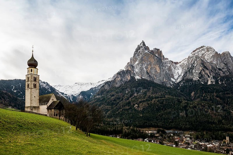 Snow-covered mountains and church