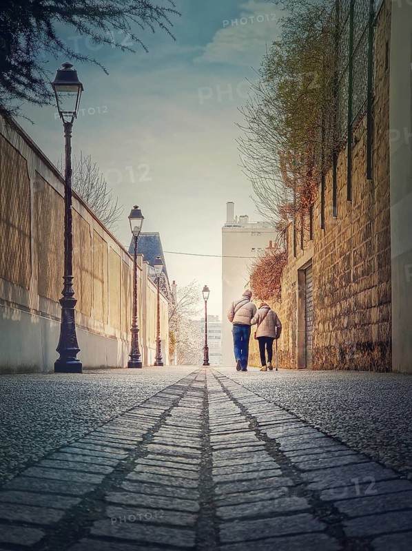 Senior couple walking outdoors together. Healthy lifestyle