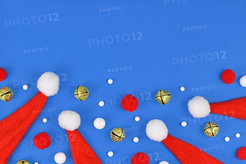 Christmas flat lay with red santa hats