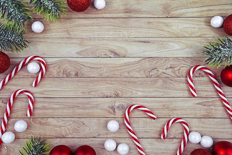 Seasonal Christmas flat lay with traditional red tree ornament baubles