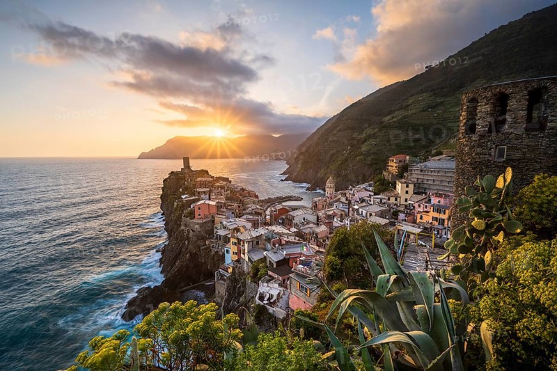 View of the colourful houses of Vernazza at sunset