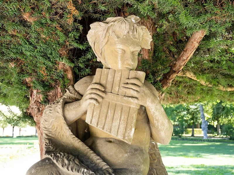 Statue of the shepherd god Pan in the Court Garden
