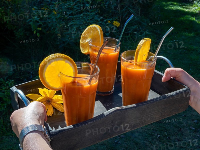 Freshly squeezed juice in juice glasses