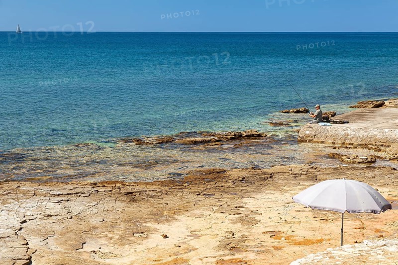 Beach on the stone coast of Beach Kastanija