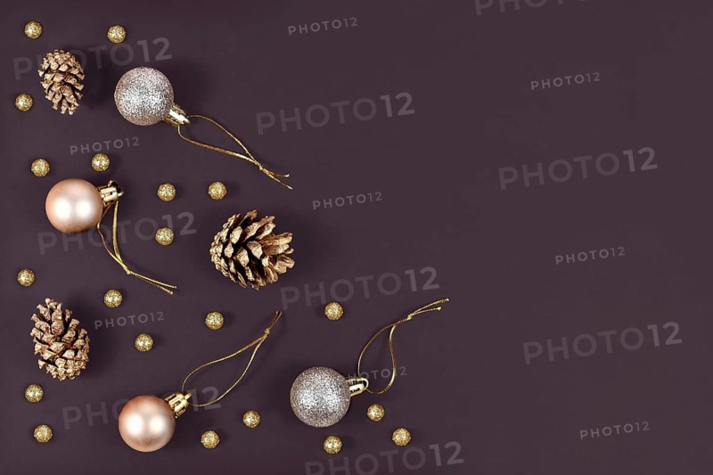 Elegant Christmas flat lay with golden and silver tree ornament baubles