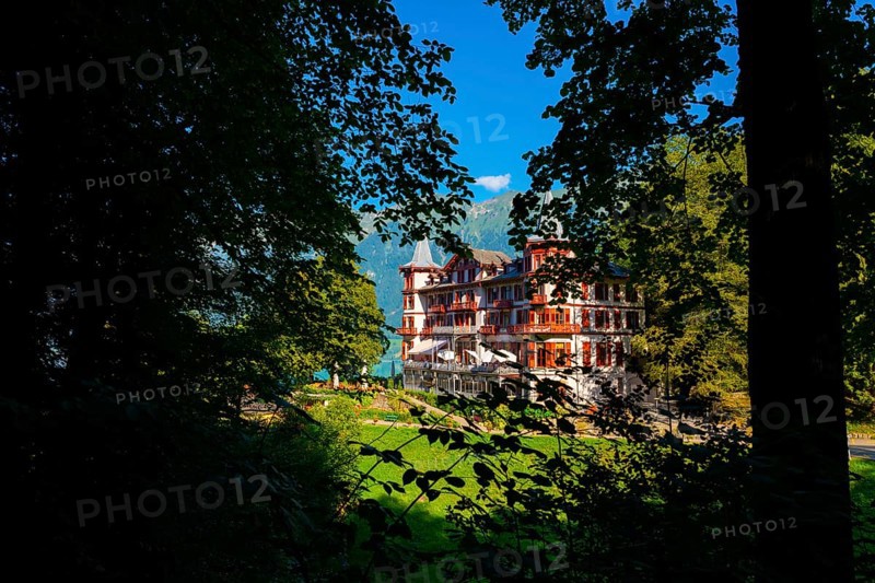 The Historical Grandhotel Giessbach on the Mountain Side in Giessbach