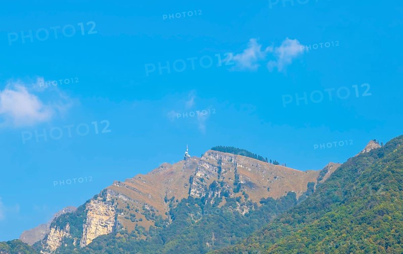 Meteorology Station on Mountain Peak with Blue Sky in a Sunny Summer Day in Ticino