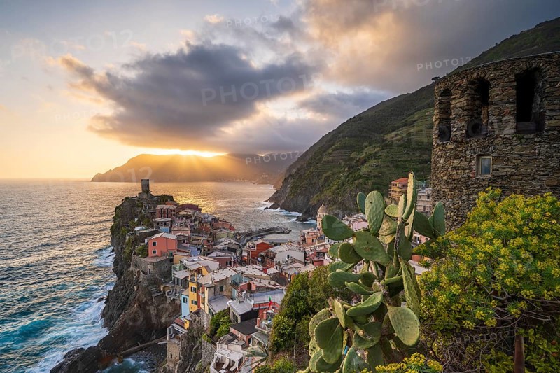 View of the colourful houses of Vernazza at sunset