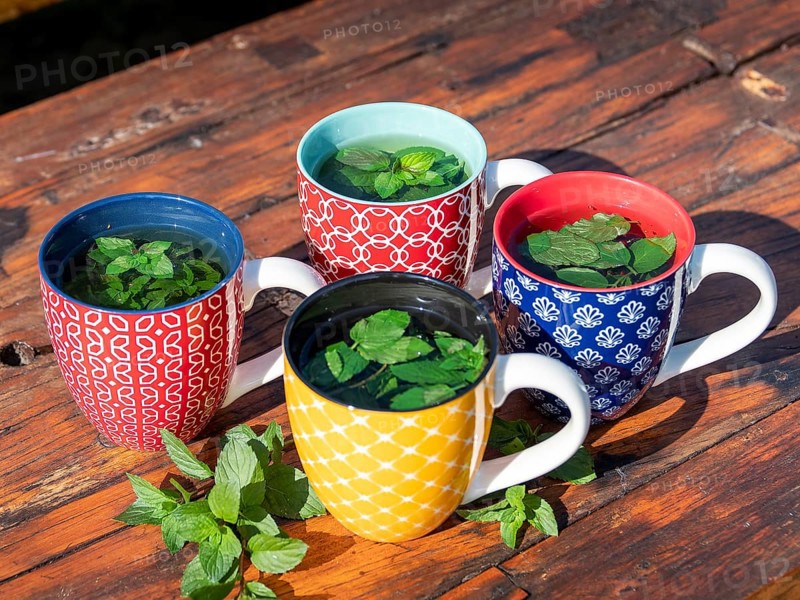 Fresh mint tea in colourful cups