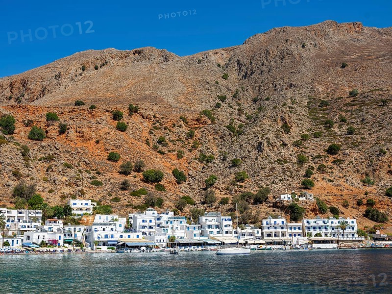The car-free Loutro below a rocky mountain