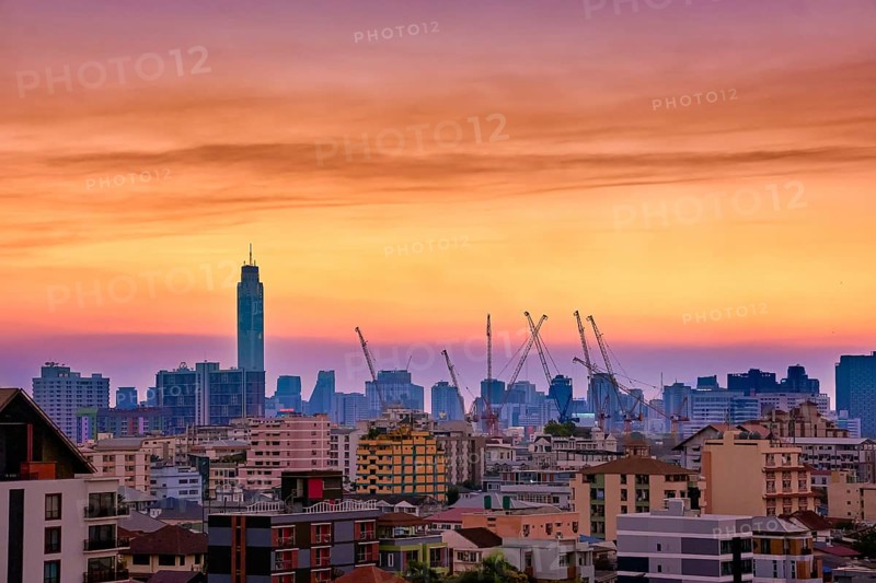 Colorful sunset over big city