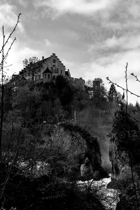 Rhine Falls and Swiss Flag with the Castle Laufen at Neuhausen