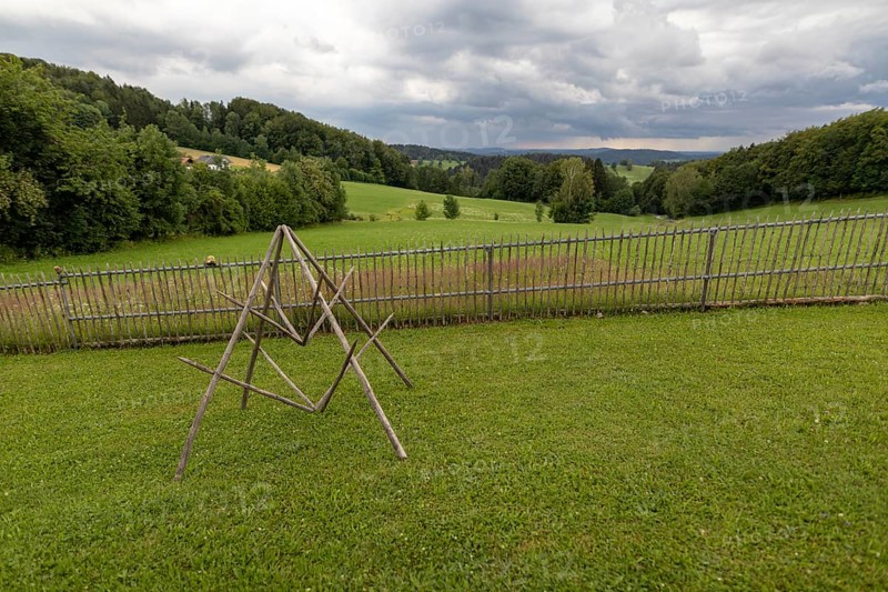 Rainy weather with meadow and farm