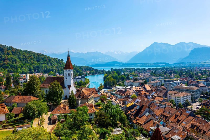 Aerial View over City of Thun and Lake with Mountain Range in a Sunny Day in Thun