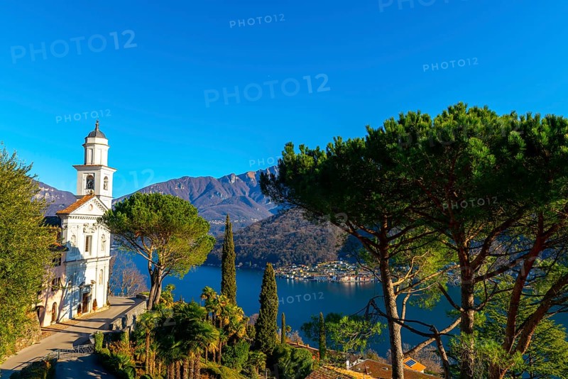 Church of Saints Fedele and Simone and Lake Lugano with Mountain in a Sunny Day in Vico Morcote