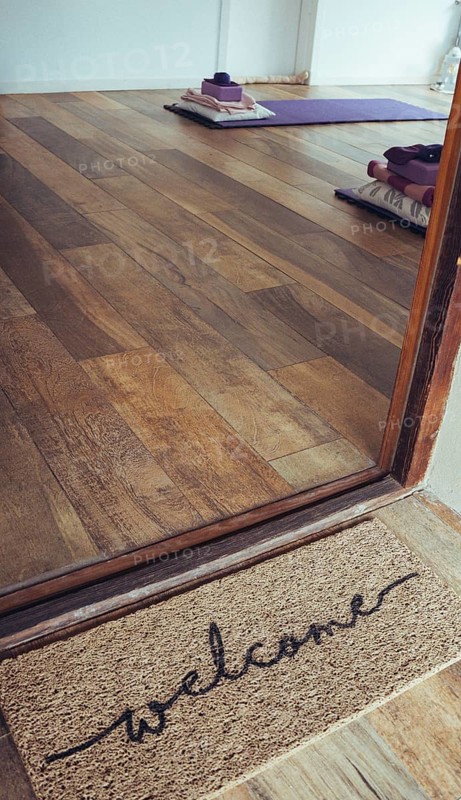 Welcome coir doormat outside a Yoga Studio