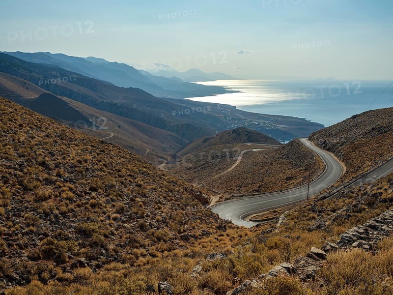 View over Anapoli Gorge to mountain road and mountains of the south coast