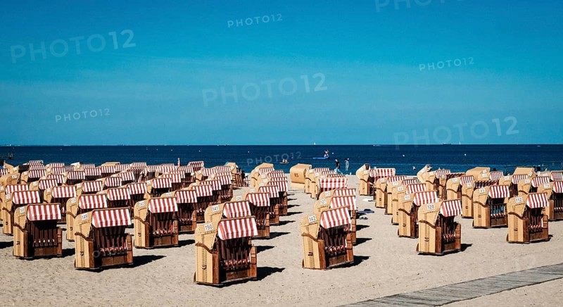 Beach chairs on the Baltic Sea beach in Travemuende. Schleswig-Holstein