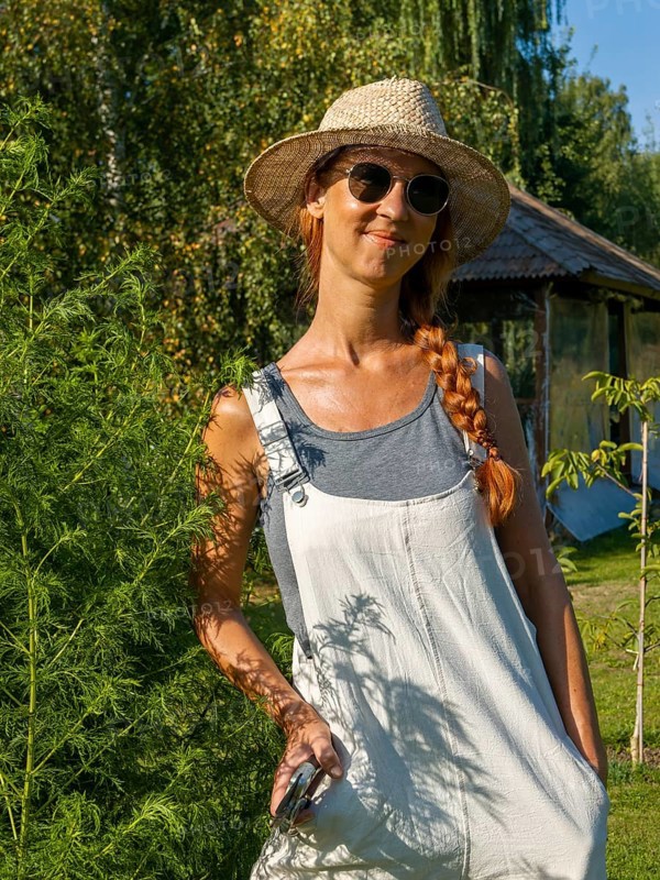 Woman in herb bed